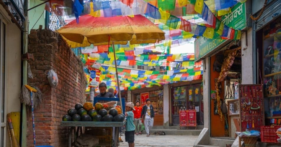Street with prayer flags in Kathmandu, chaos and rest at the same time